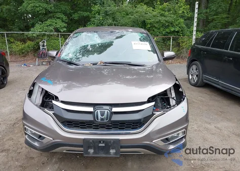 2015 Honda Cr-V Touring z USA, uszkodzony, nr VIN 5J6RM4H9XFL061928